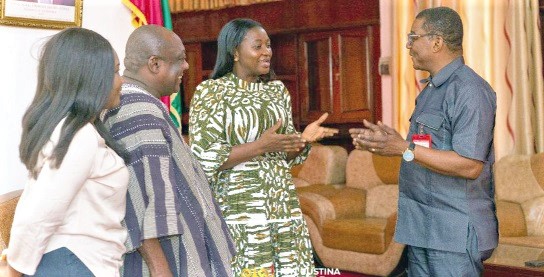 Kobby Asmah (right), the Editor, Graphic, interacting with Justina Marigold Assan, Central Regional Minister. With them include Shirley Asiedu Addo (left), the paper’s Central Regional correspondent